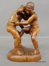 Carved wood figural group of t