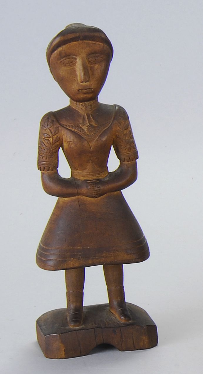 CARVED WOOD FIGURE OF A