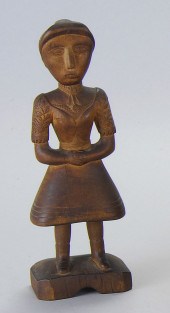 CARVED WOOD FIGURE OF A GIRLPo