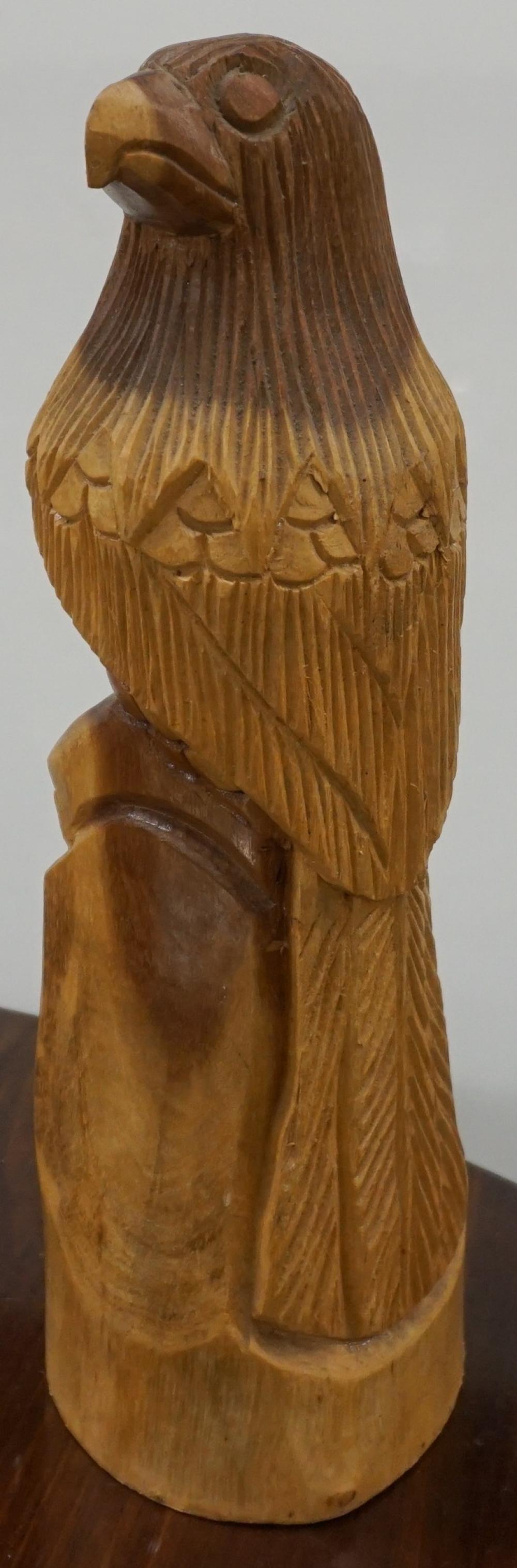 CARVED WOOD FIGURE OF A FALCON,