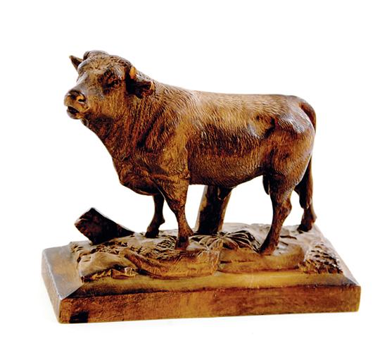 Carved wood figure of bull possibly