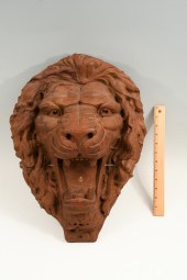 CARVED WOOD LION'S HEAD FROM A