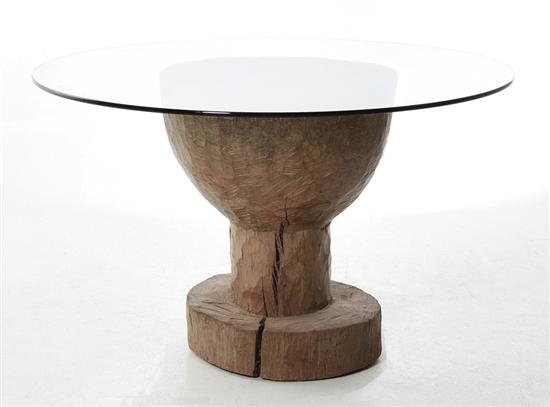 Carved wood pedestal with glass top