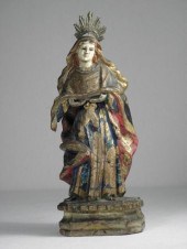 Carved wood santos . Polychrom
