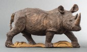 CARVED WOOD SCULPTURE OF A RHI