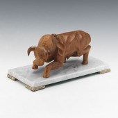 CARVED WOOD SCULPTURE OF CHARG