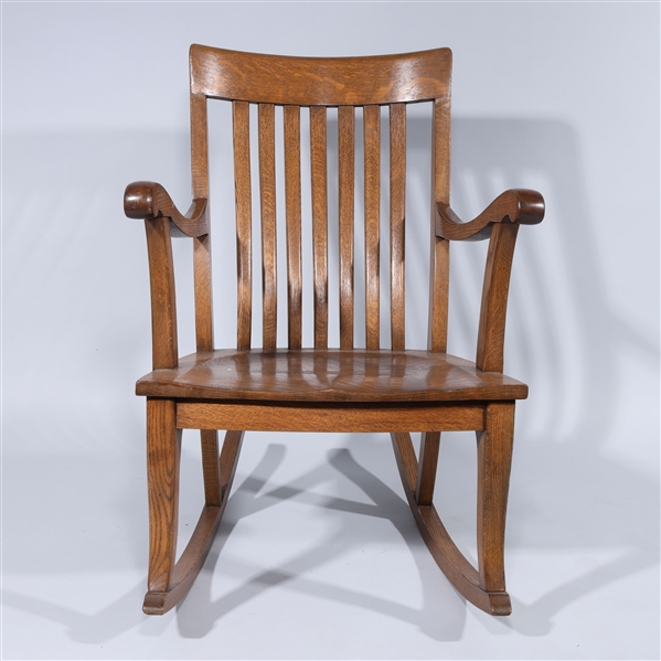 Carved wood slat back rocking