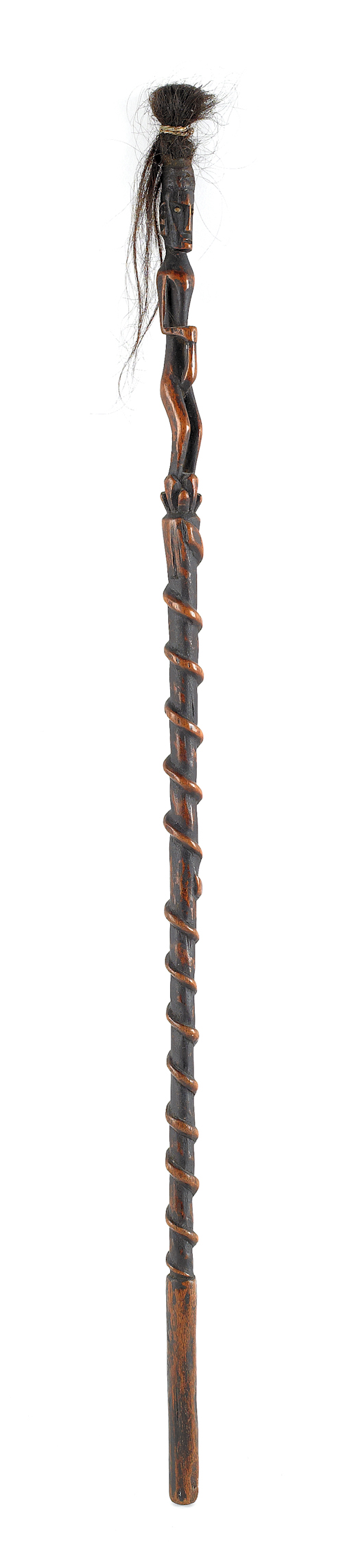 Carved wooden African cane in the
