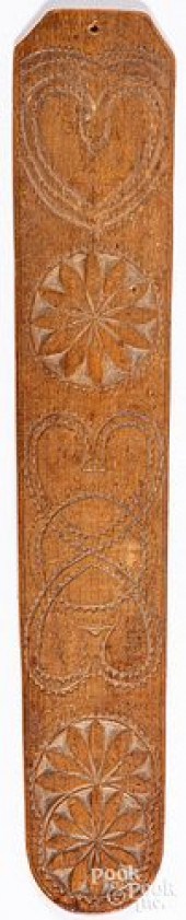CARVED WOODEN BUSK, 19TH C.Car