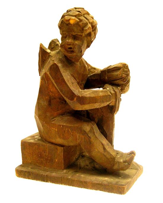 Carved wooden figure of Cupid 