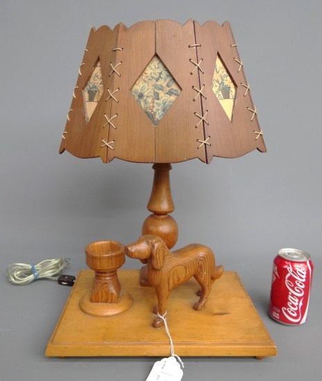 Carved wooden folk art lamp with