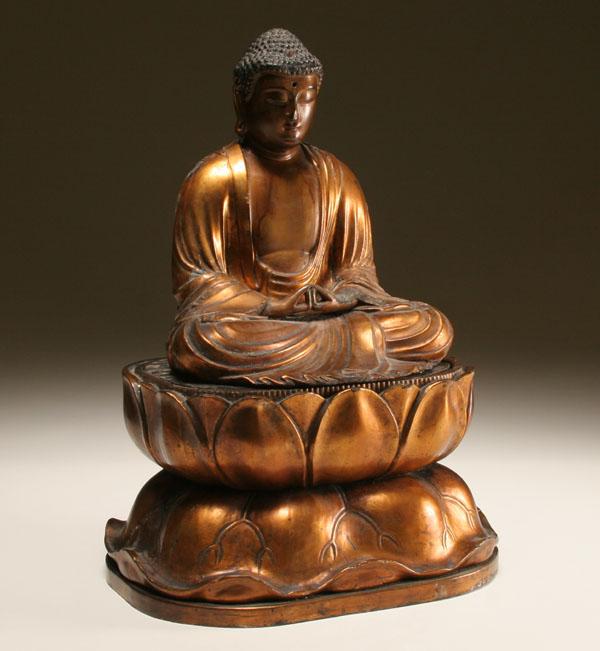 Carved wooden Quanyin figure with a