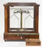 CASED BALANCE SCALE BY CHRISTI