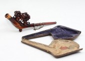 CASED BRIARWOOD? PIPE: Carved