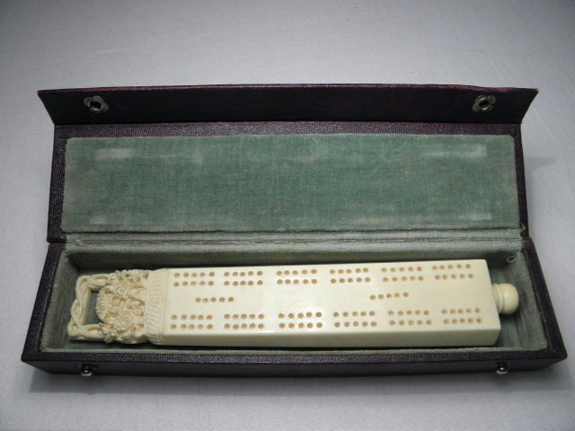 Cased carved ivory cribbage board