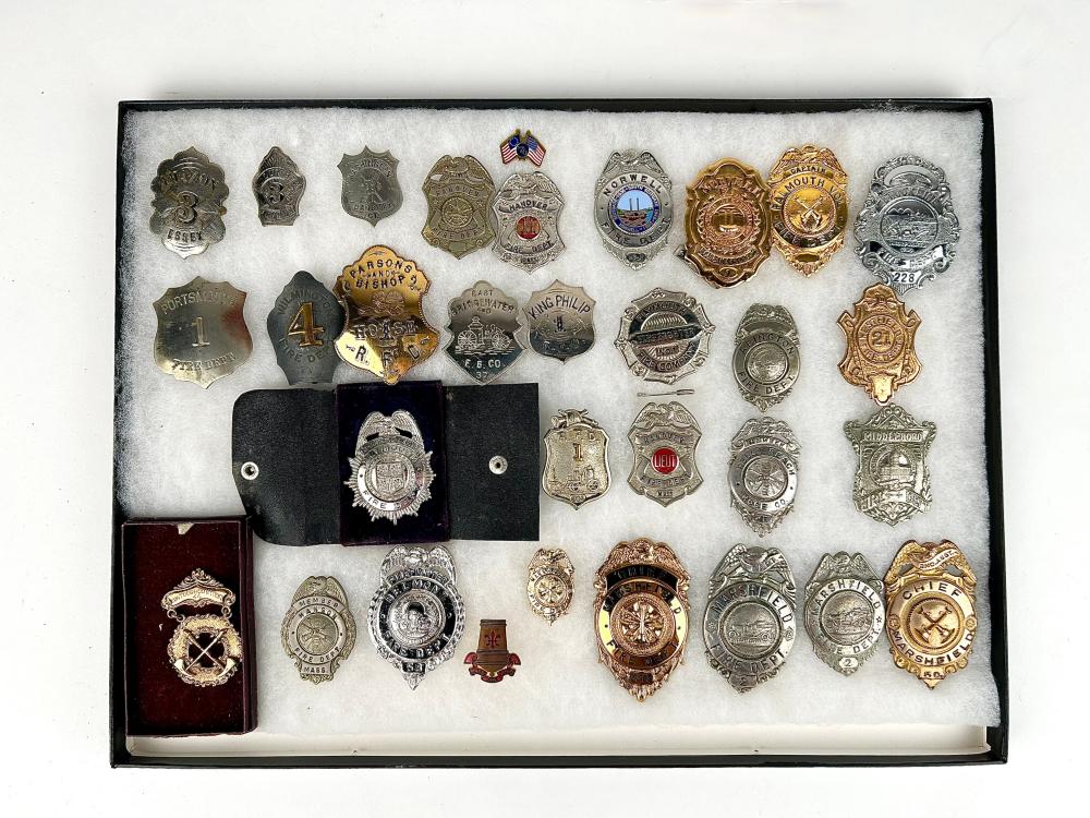 CASED COLLECTION OF THIRTY-ONE FIRE