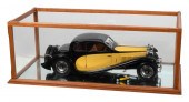 CASED MODEL OF A BUGATTI TOURI