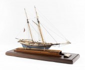 CASED SCALE MODEL OF THE "PRID