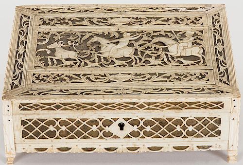 CASED SET OF 140 SCRIMSHAWED