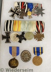 Cased tray of medals and ribbo