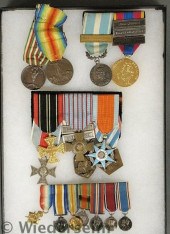 Cased tray of medals and ribbo