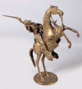 CAST BRASS FIGURE OF A RIDER O