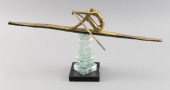 CAST BRONZE SCULPTURE OF A ROW