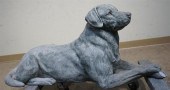 CAST CEMENT FIGURE OF RECUMBEN