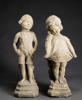 CAST CEMENT FIGURES OF BOY AND