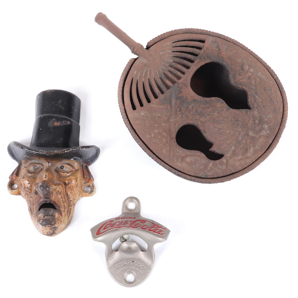 CAST IRON 3PC.; TWO BOTTLE OPENERS,