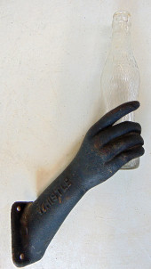 CAST IRON ADVERTISING SIGN, WH