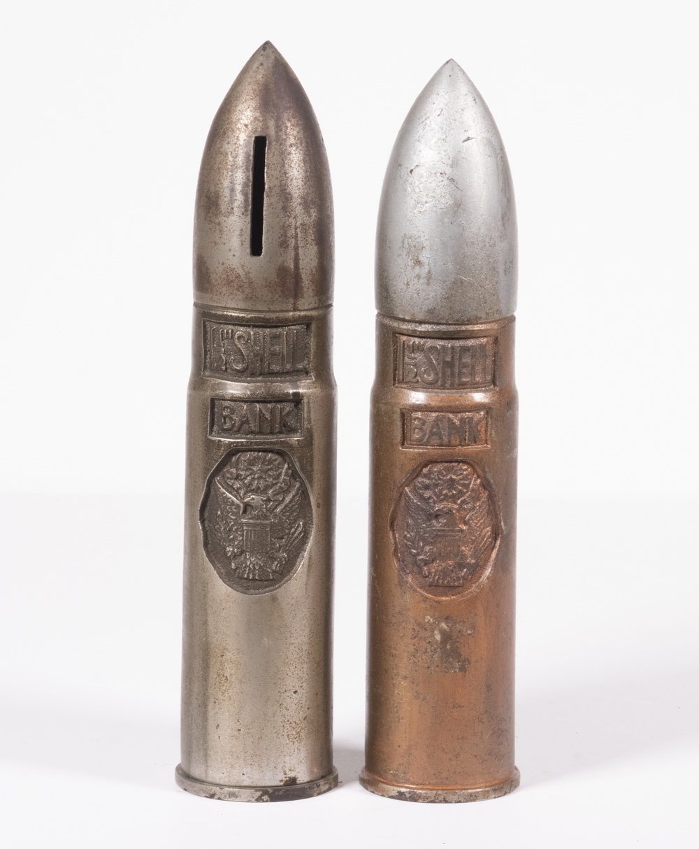 CAST IRON ARTILLERY SHELL BANKS (2)