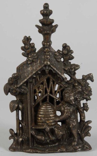 Cast Iron Bear Stealing Honey Still