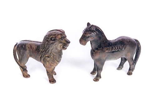 CAST IRON BEAUTY AND LION PENNY