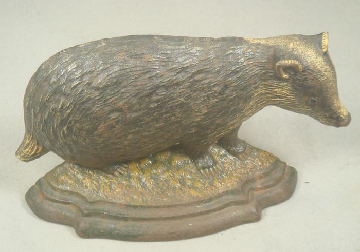 Cast iron doorstop, brown and