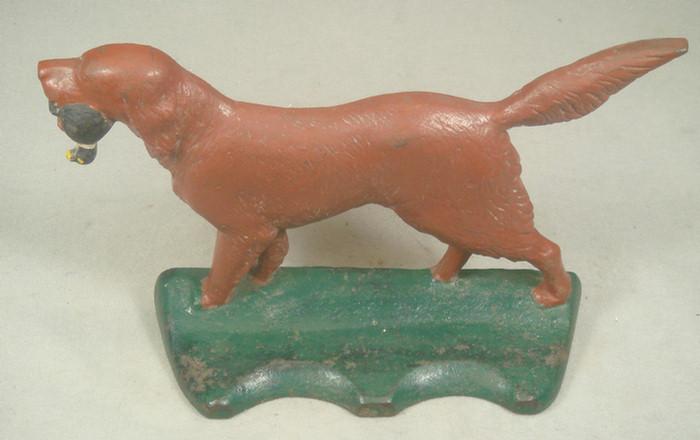 Cast iron doorstop, brown English
