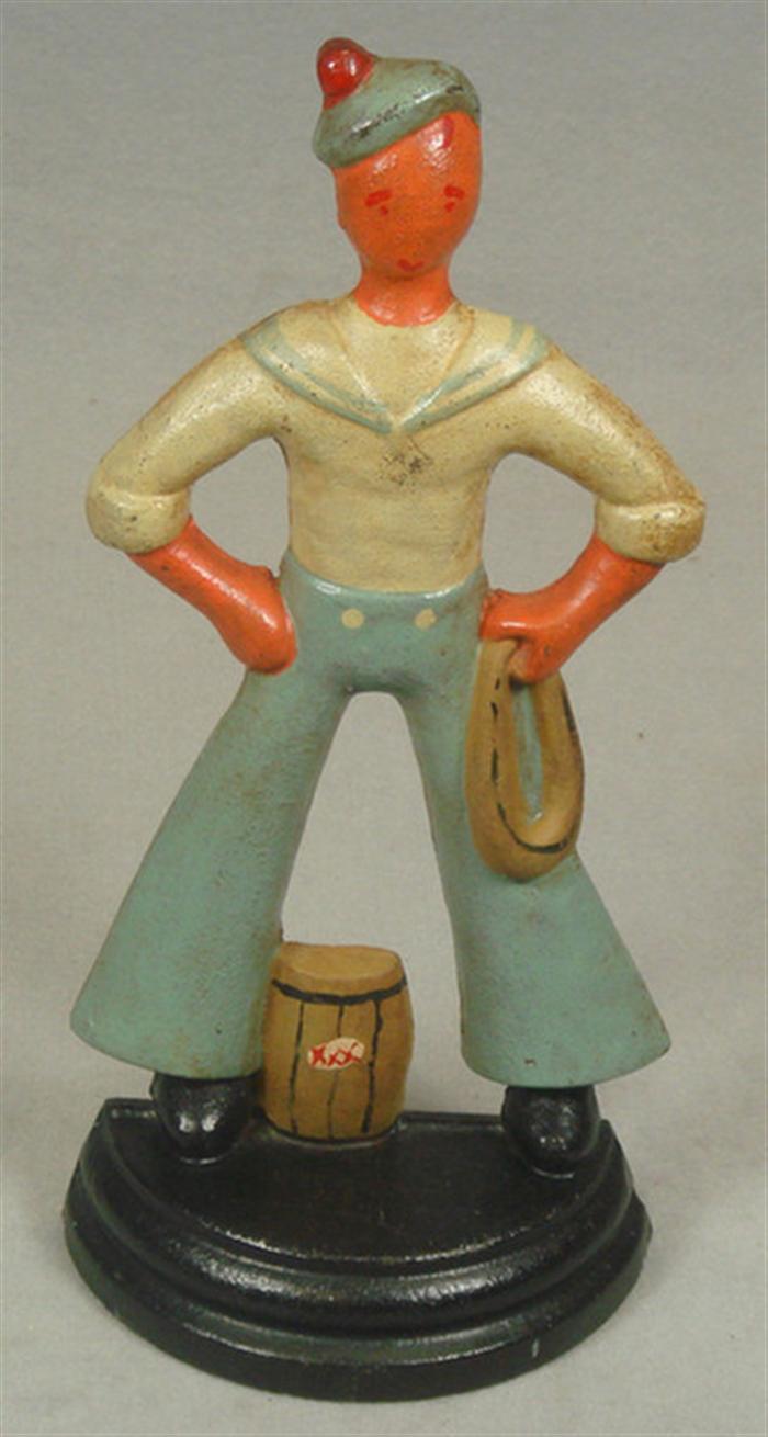 Cast iron doorstop, caricature