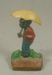Cast iron doorstop, child unde