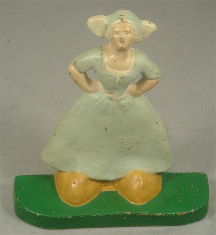 Cast iron doorstop, Dutch woman