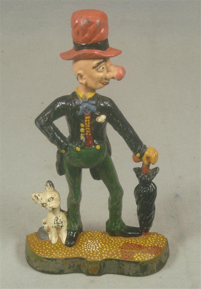 Cast iron doorstop, early comic