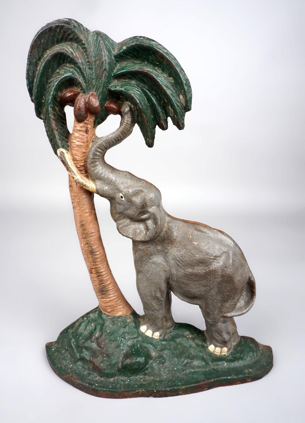 CAST IRON DOORSTOP IN THE FORM OF