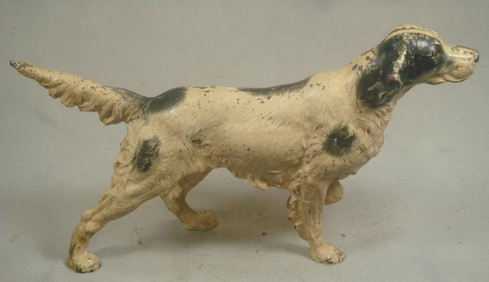 Cast iron doorstop, large tan and