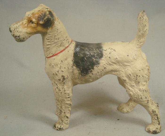 Cast iron doorstop, large tan and