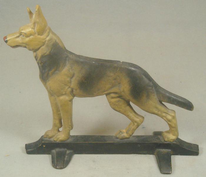 Cast iron doorstop, large tan and