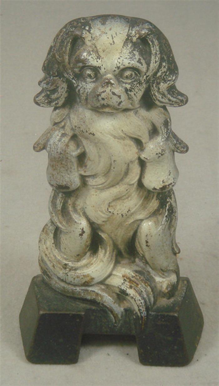 Cast iron doorstop, long haired tan