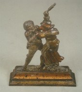 Cast iron doorstop, man and wo