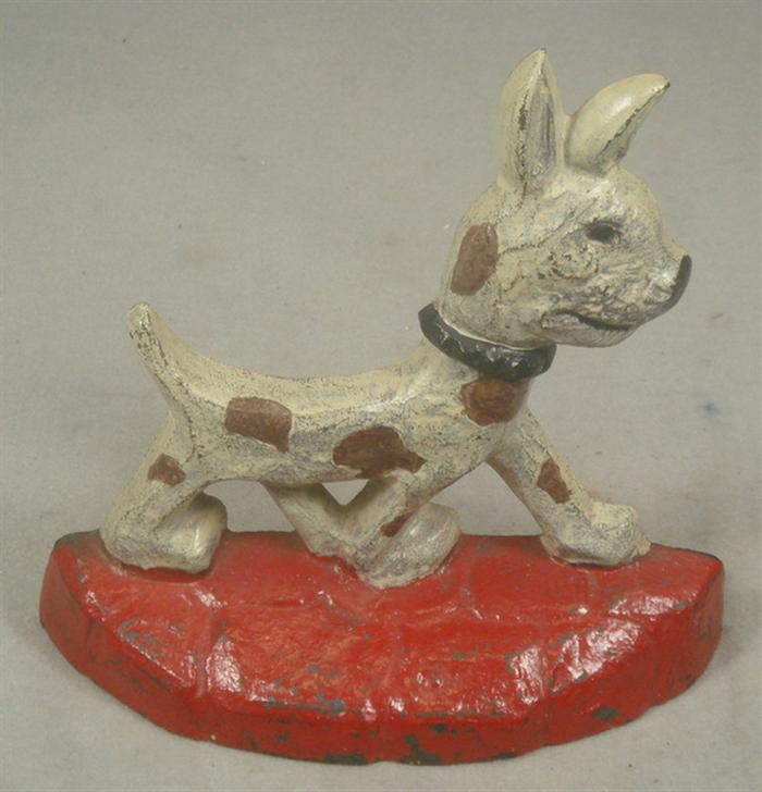 Cast iron doorstop, tan and brown