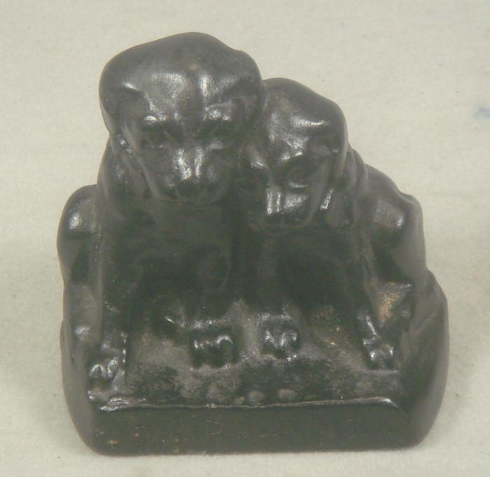 Cast iron doorstop, two puppies