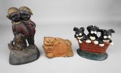CAST IRON DOORSTOPS OF PUPPIES