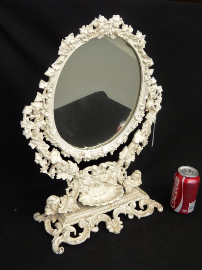 Cast iron dresser mirror.